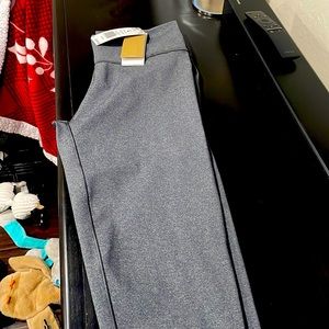Brand New  Womens Adidas work out leggings.   grey size LG but fits like a Med